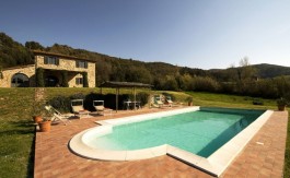 Villa Maurino Tuscany exterior with stunning pool and panoramic views